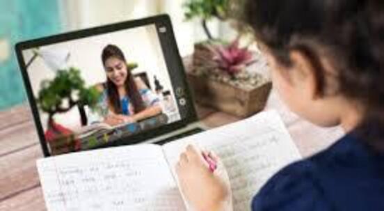 Student attending live online NEET coaching session on laptop